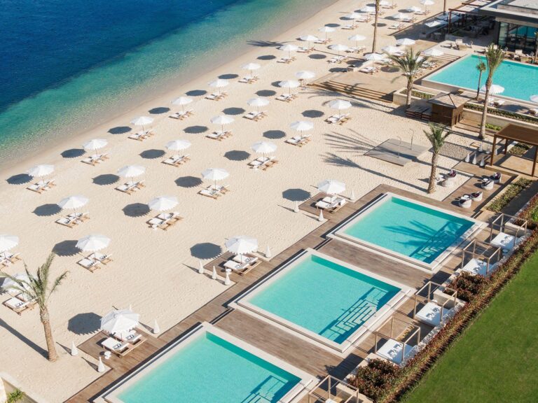 Pools, beach and sun loungers at One&Only Portonovi on Boka Bay