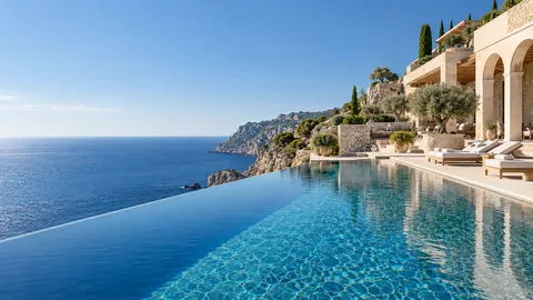 Infinity pool overlooking the sea at a fictional coastal hotel